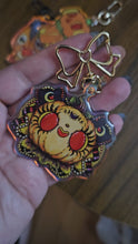 Load and play video in Gallery viewer, &quot;Princess Honey&quot; in Orange - Acrylic Charm by Scribble Creatures
